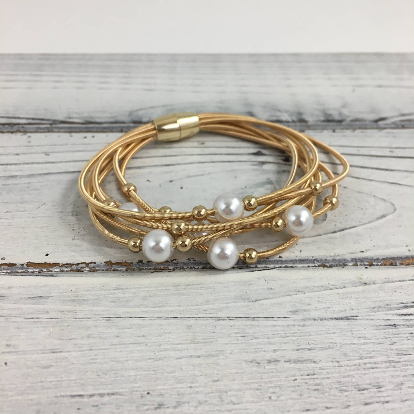 Pearl guitar string bracelet